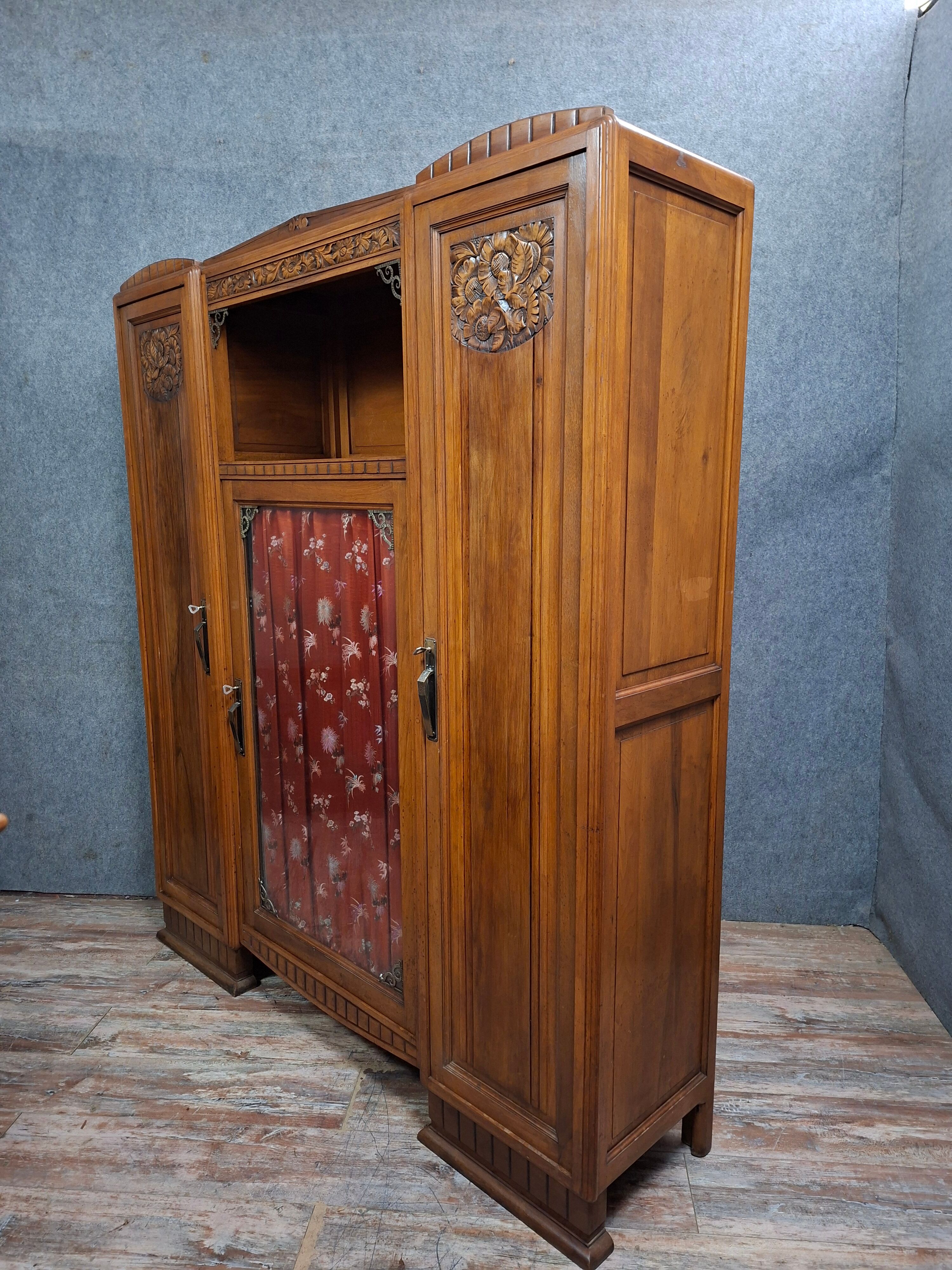 Art Deco library in carved walnut, circa 1930