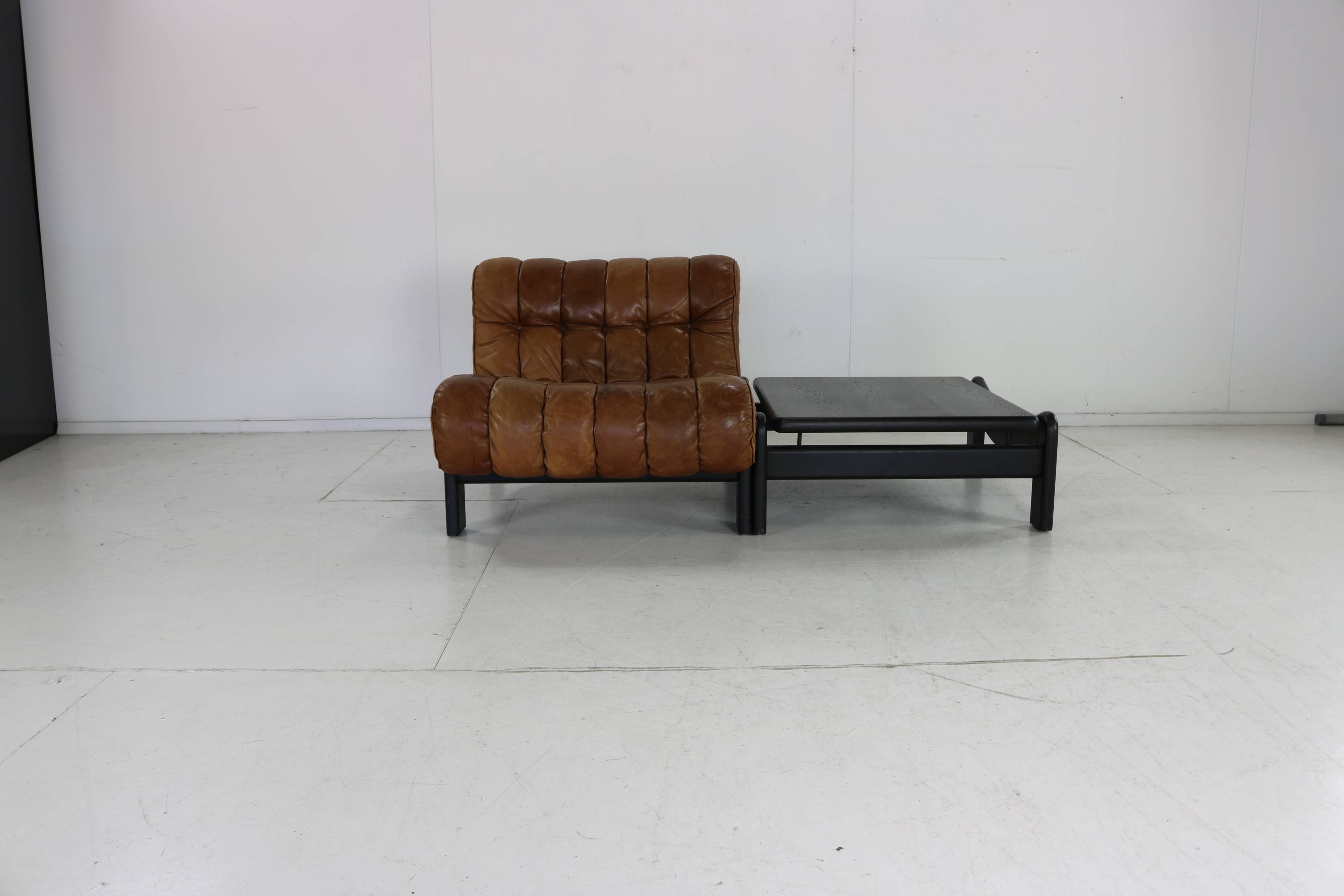 70s living room set in cognac brown leather with black wenge wood frame