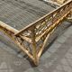 1960s rattan bed with metal base.