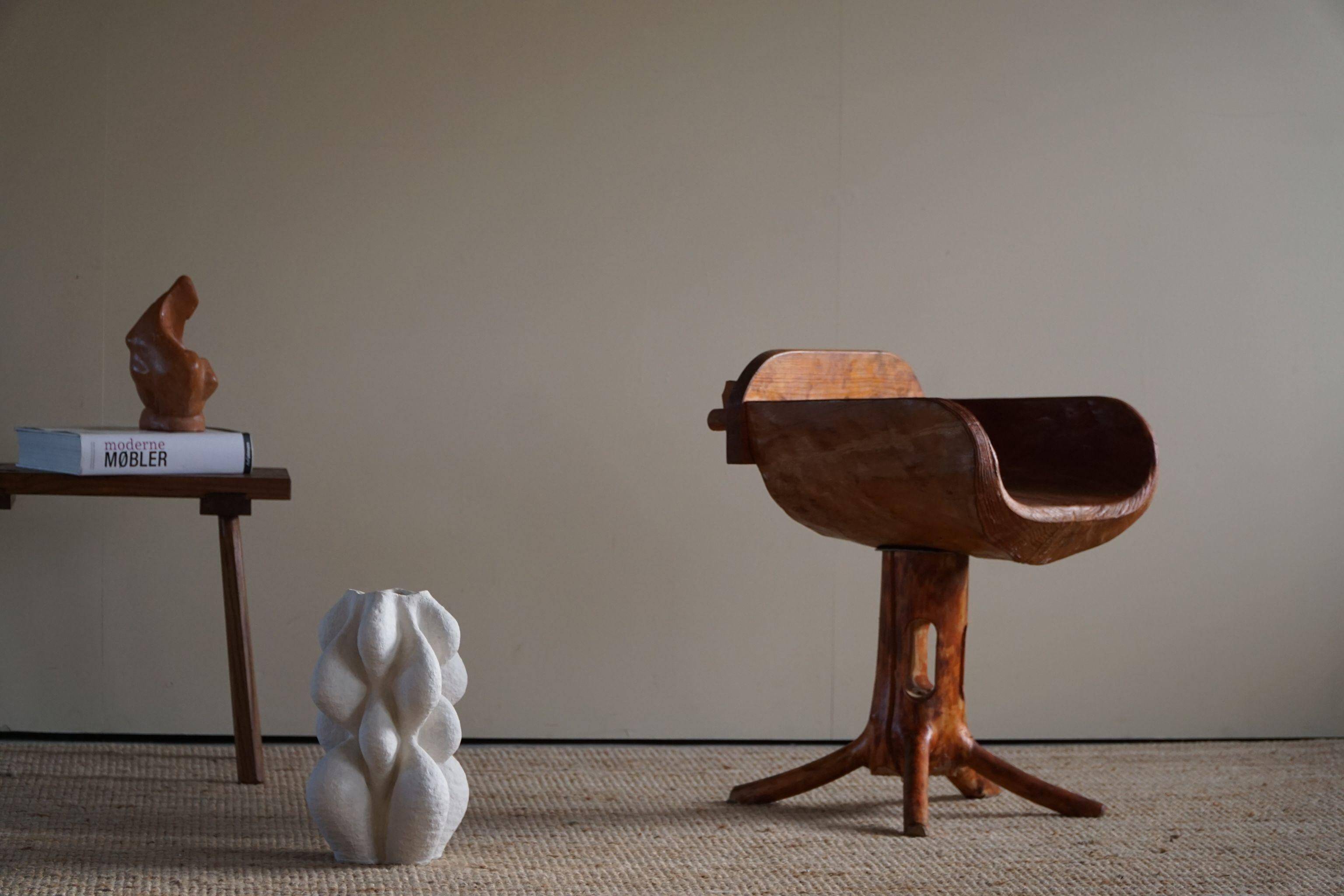 Unique sculptural pedestal armchair by the Finnish Matti Martikka in solid pine, 1960s.