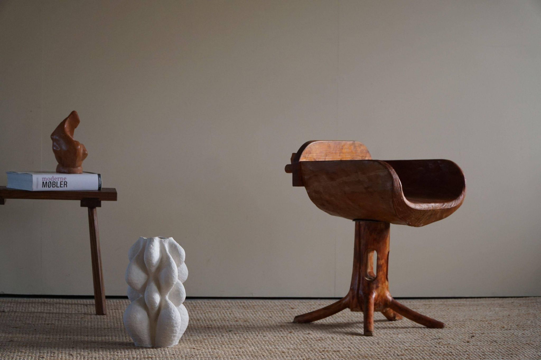 Unique sculptural pedestal armchair by the Finnish Matti Martikka in solid pine, 1960s.