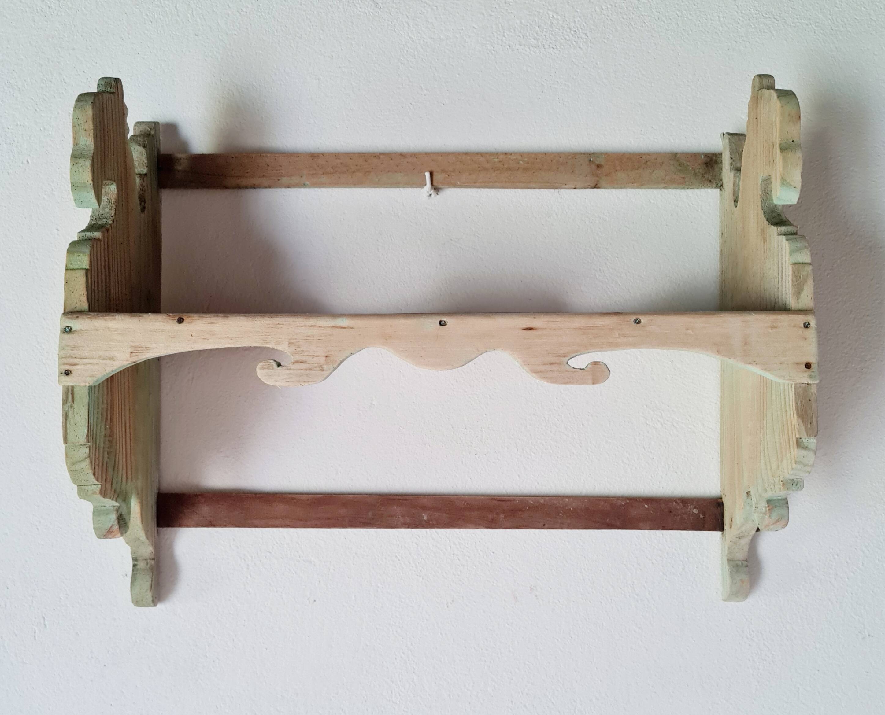 Antique wall shelf in raw wood