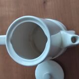 Small coffee maker with floral decoration