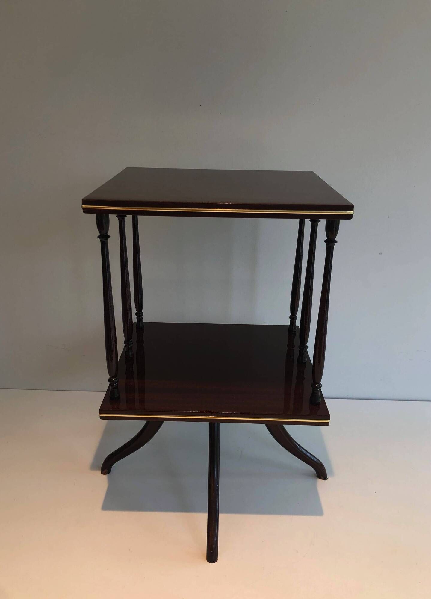 Rotating Table with Two Mahogany and Brass Platforms with Turned Columns.