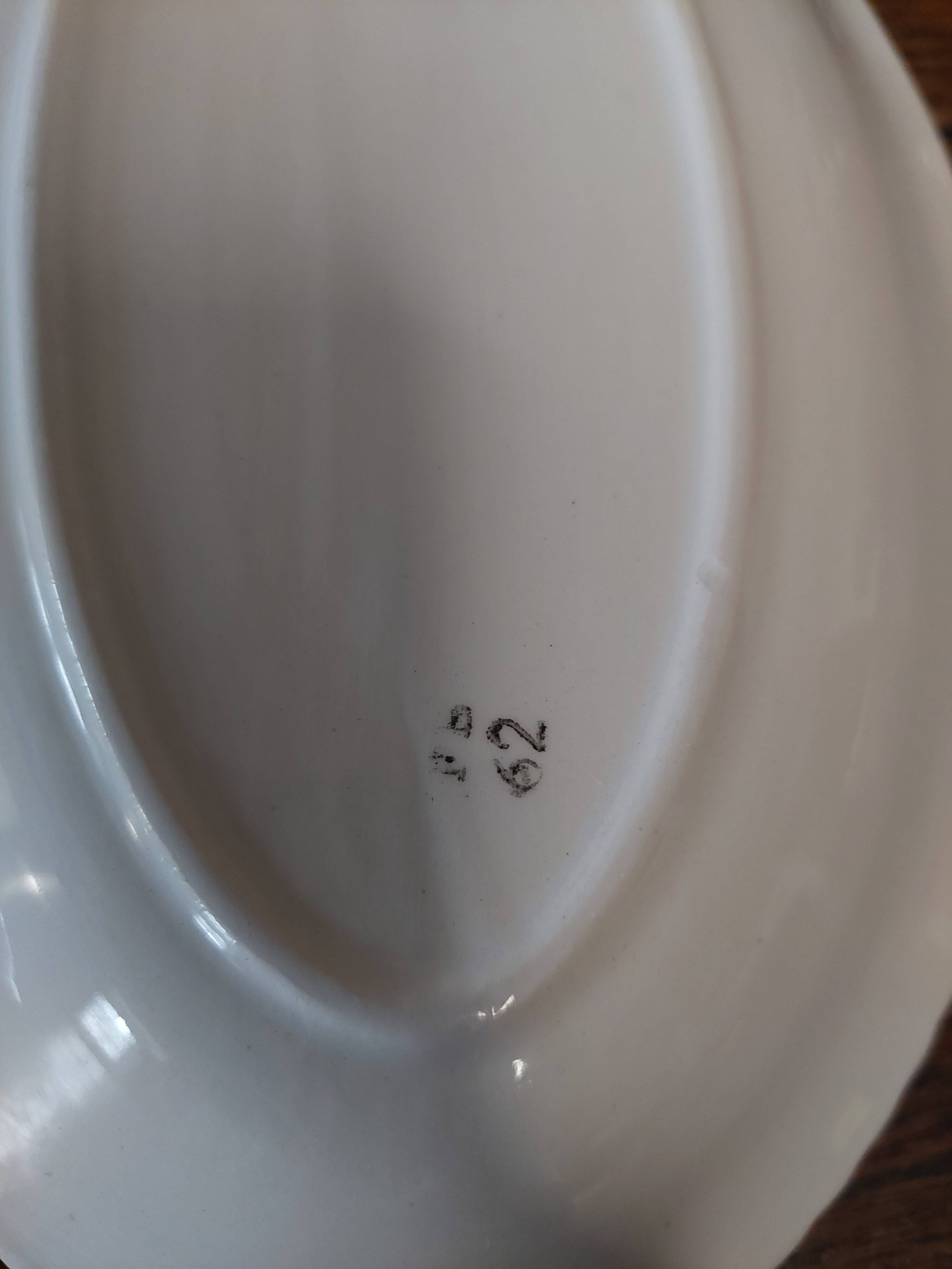 Pair of Badonviller iron earthenware dishes, Amina model