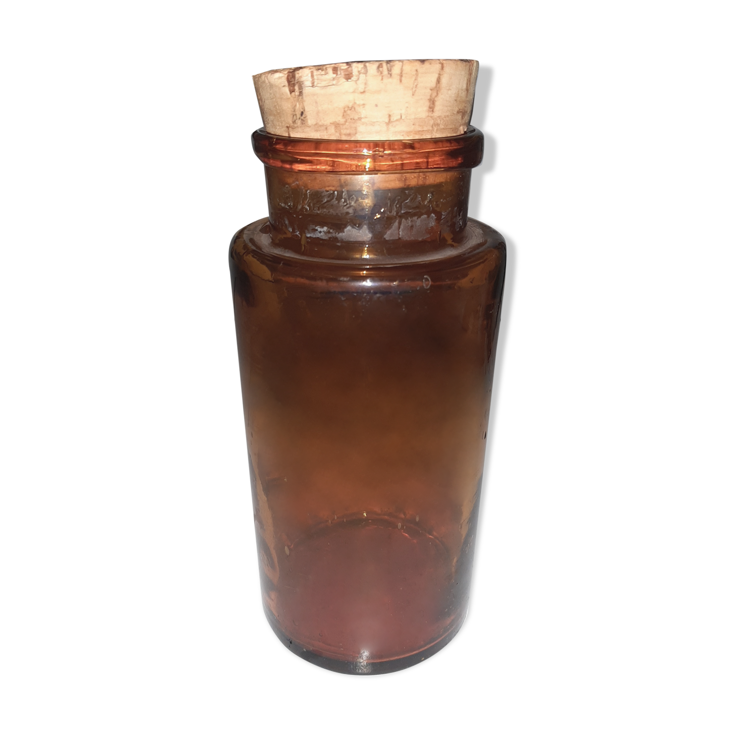 Amber pharmacy bottle made of old bubbled glass
