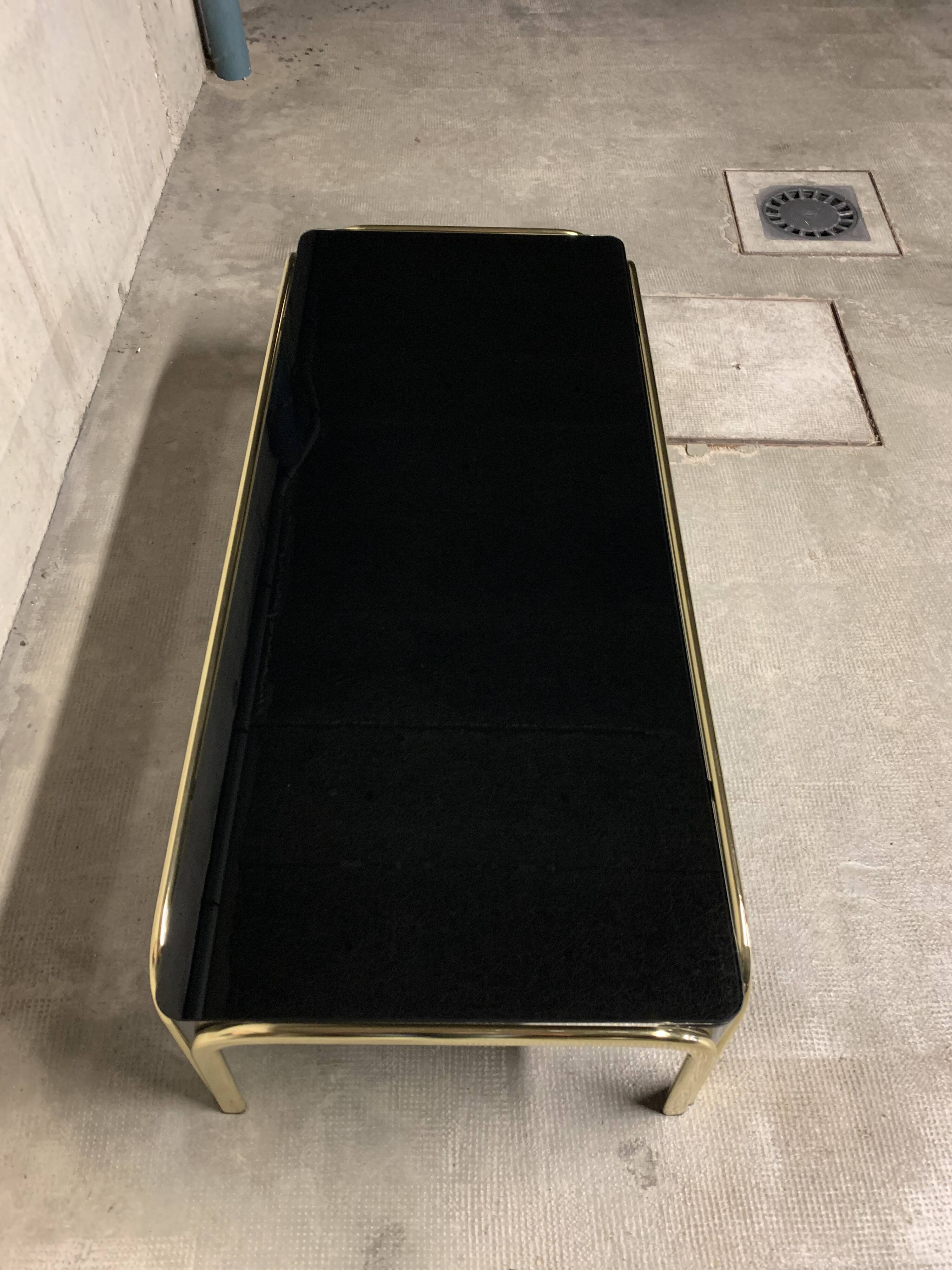 Vintage design coffee table glass and gold metal