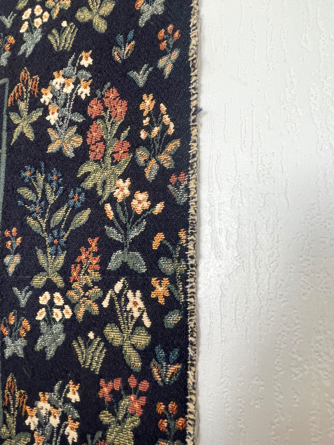 Wall tapestry panel.