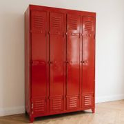 Vintage industrial wardrobe with 4 metal doors in red.