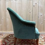 Napoleon III period crapaud armchair in green velvet.