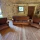 Living room with a three-seater sofa and two armchairs.
