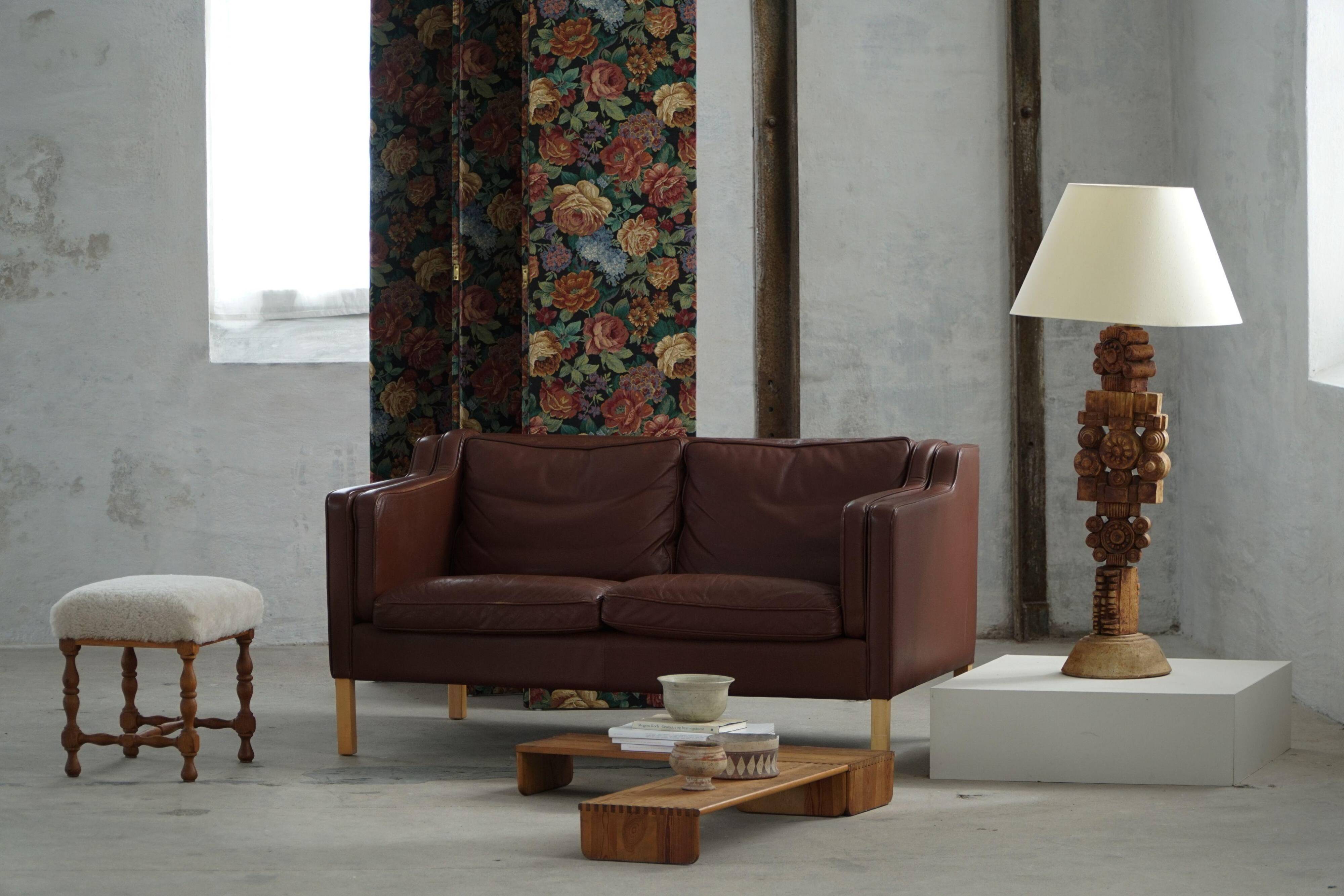 Stouby Møbelfabrik, two-seater sofa in mid-century style in brown leather, 1970s.