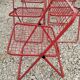 Set of 5 vintage red metal mesh folding chairs, Ted Net style.