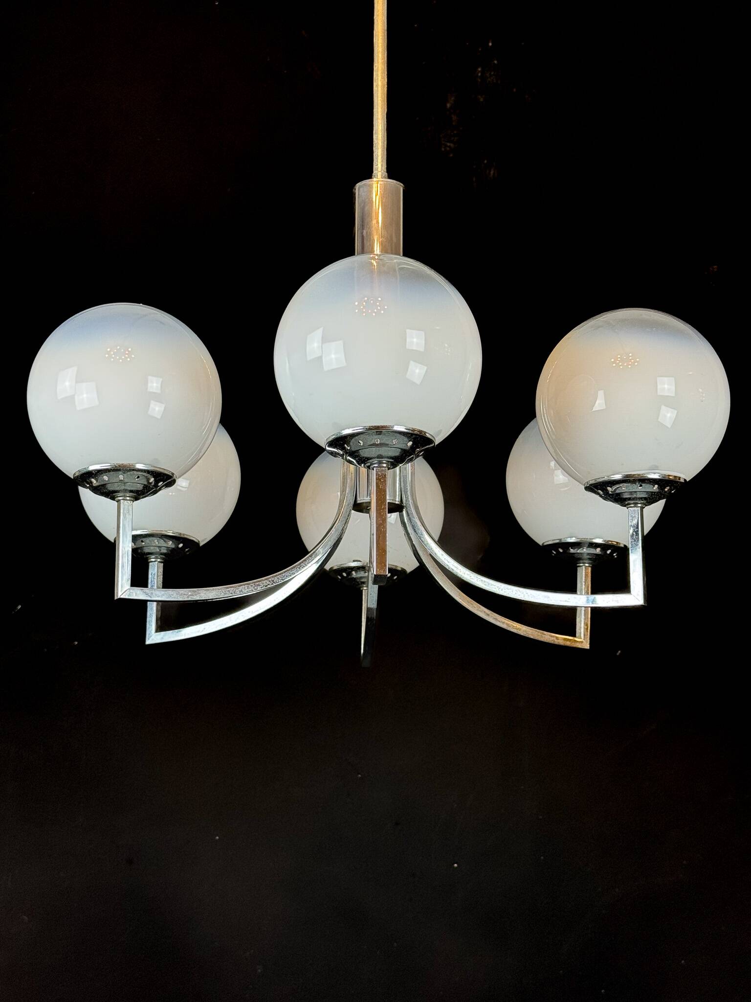 Six arms chandelier in murano glass spheres and chrome. Italy 1960s