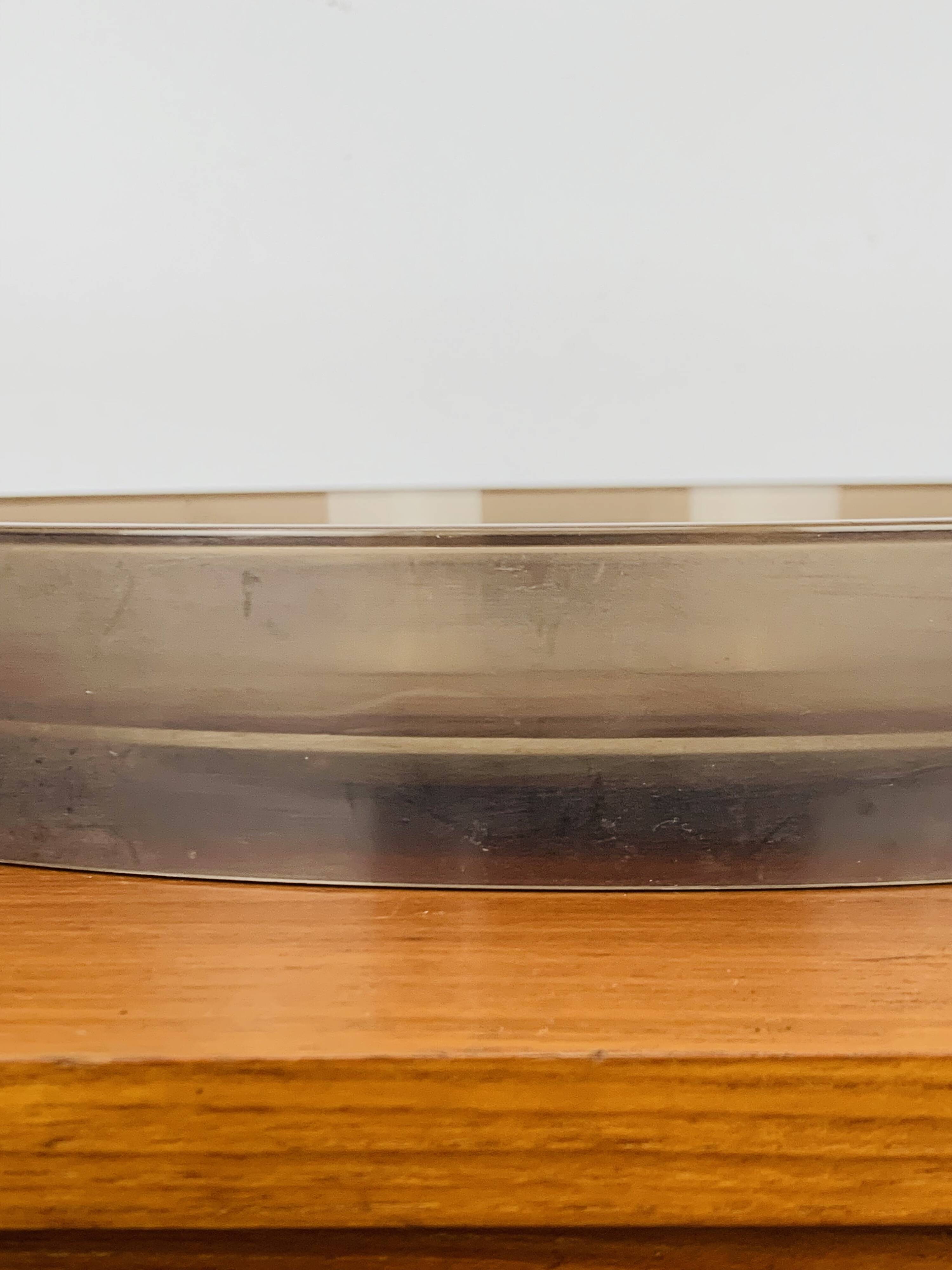 Round mirror with amber rim from the 70s, vintage