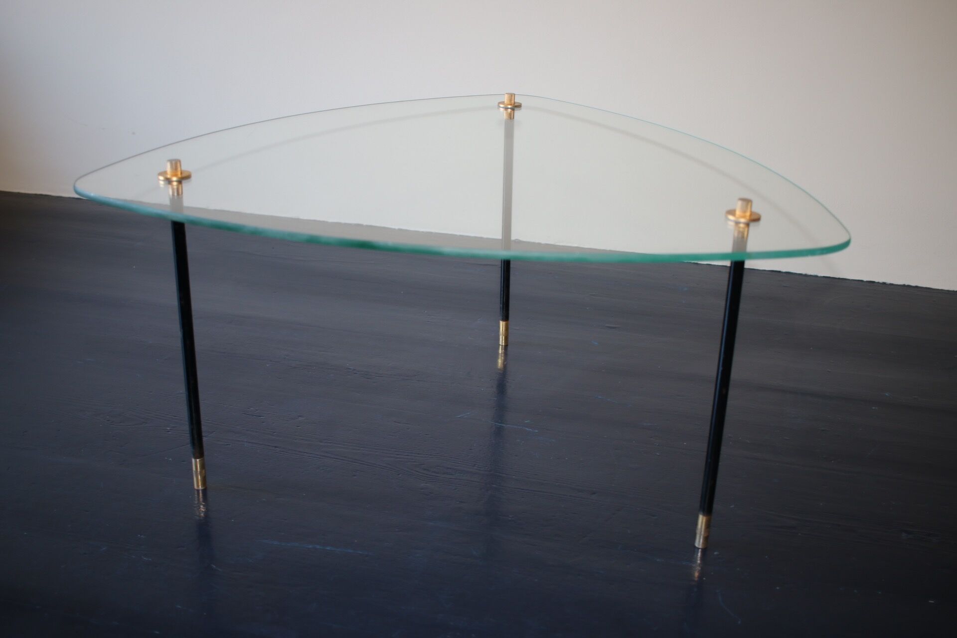 Vintage glass and black-painted brass side table