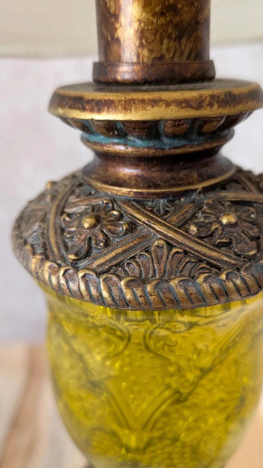 Vintage lamp with bronze imitation base & green relief glass in an antique style.