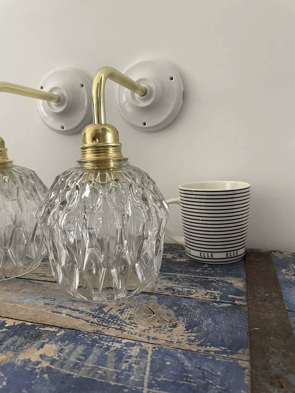 Pair of chiseled glass wall sconces