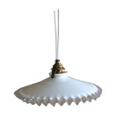 Old suspension in dented opaline
