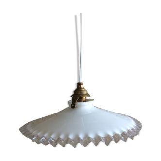 Old suspension in dented opaline