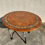 Round garden table in mosaic and iron