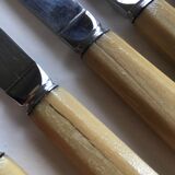 Series of 12 antique stainless steel knives