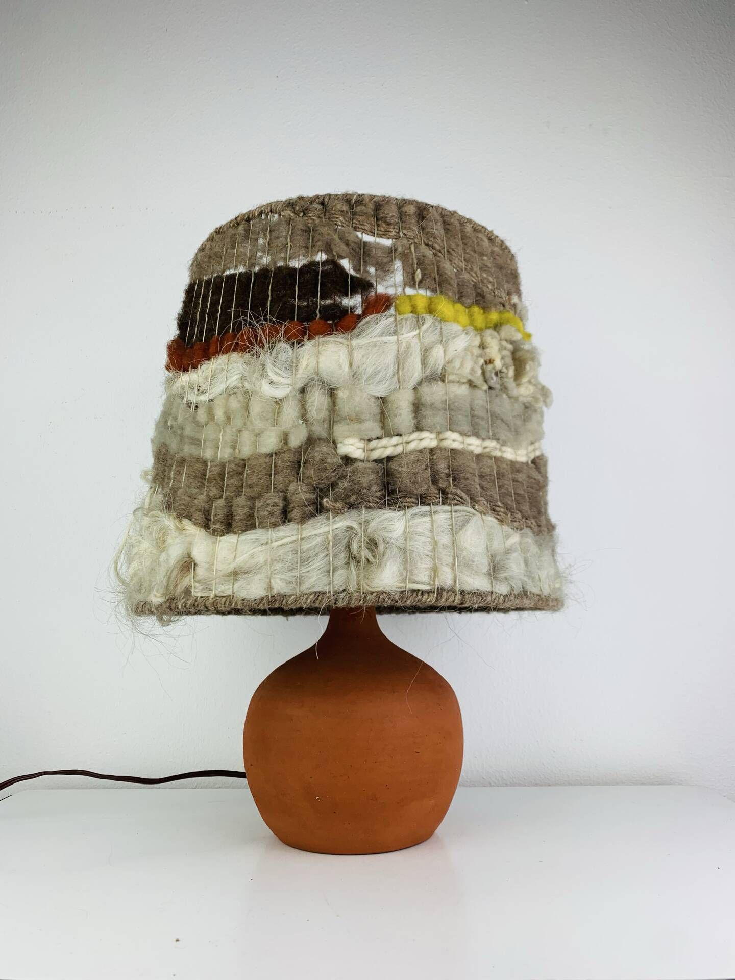 Terracotta globe lamp with a wool shade from the 1960s.