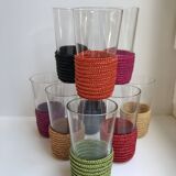 set of 9 small glasses with colored rattan support from the 70s
