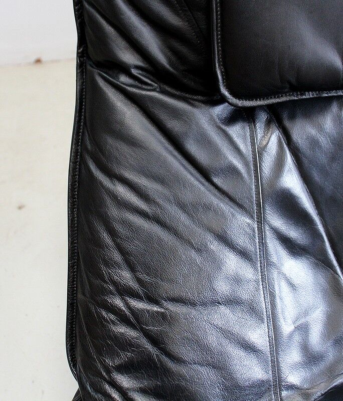 Leather and beech relaxation chair - 1970 / 1980