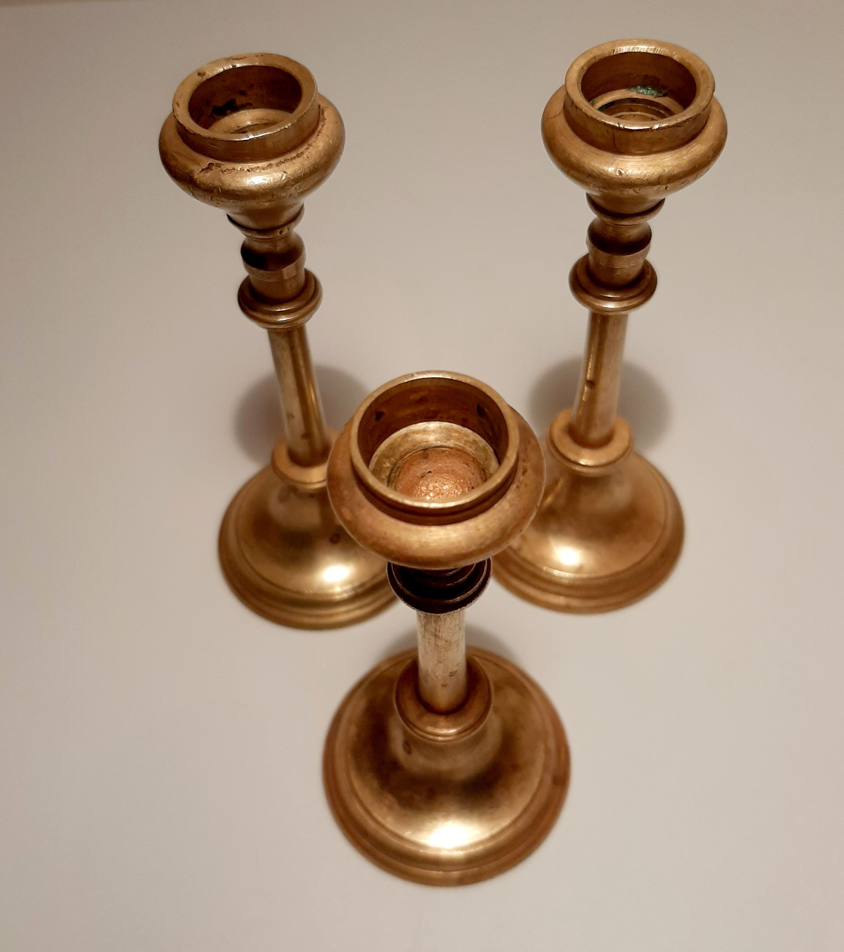 Set of gilded brass candle holders