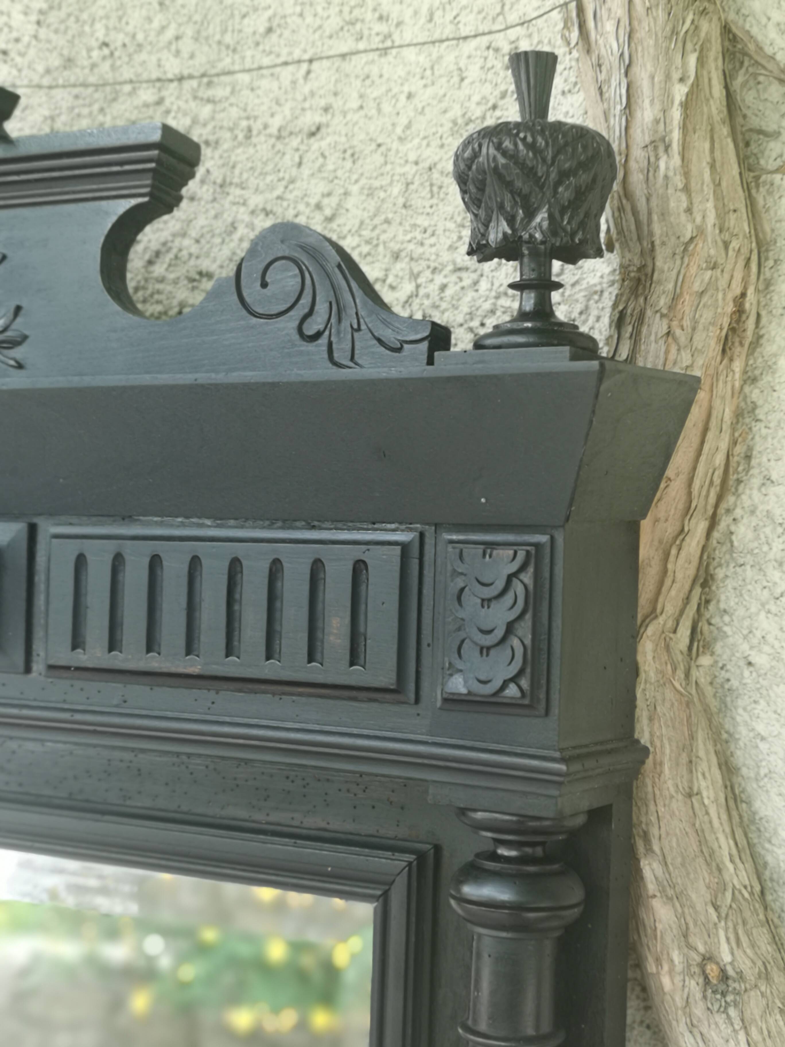 Trumeau mirror in blackened wood 19th