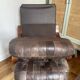 1970s Scandinavian armchair in curved laminated wood with a leather seat.
