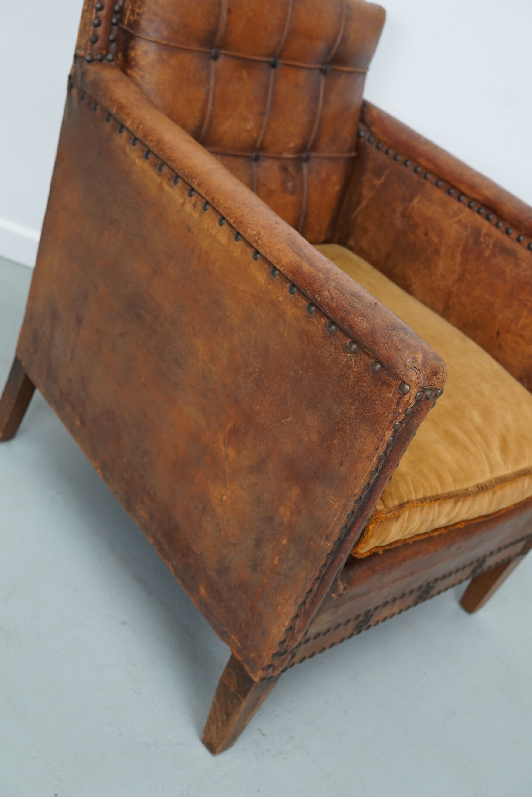 French cognac leather buttoned back club chair