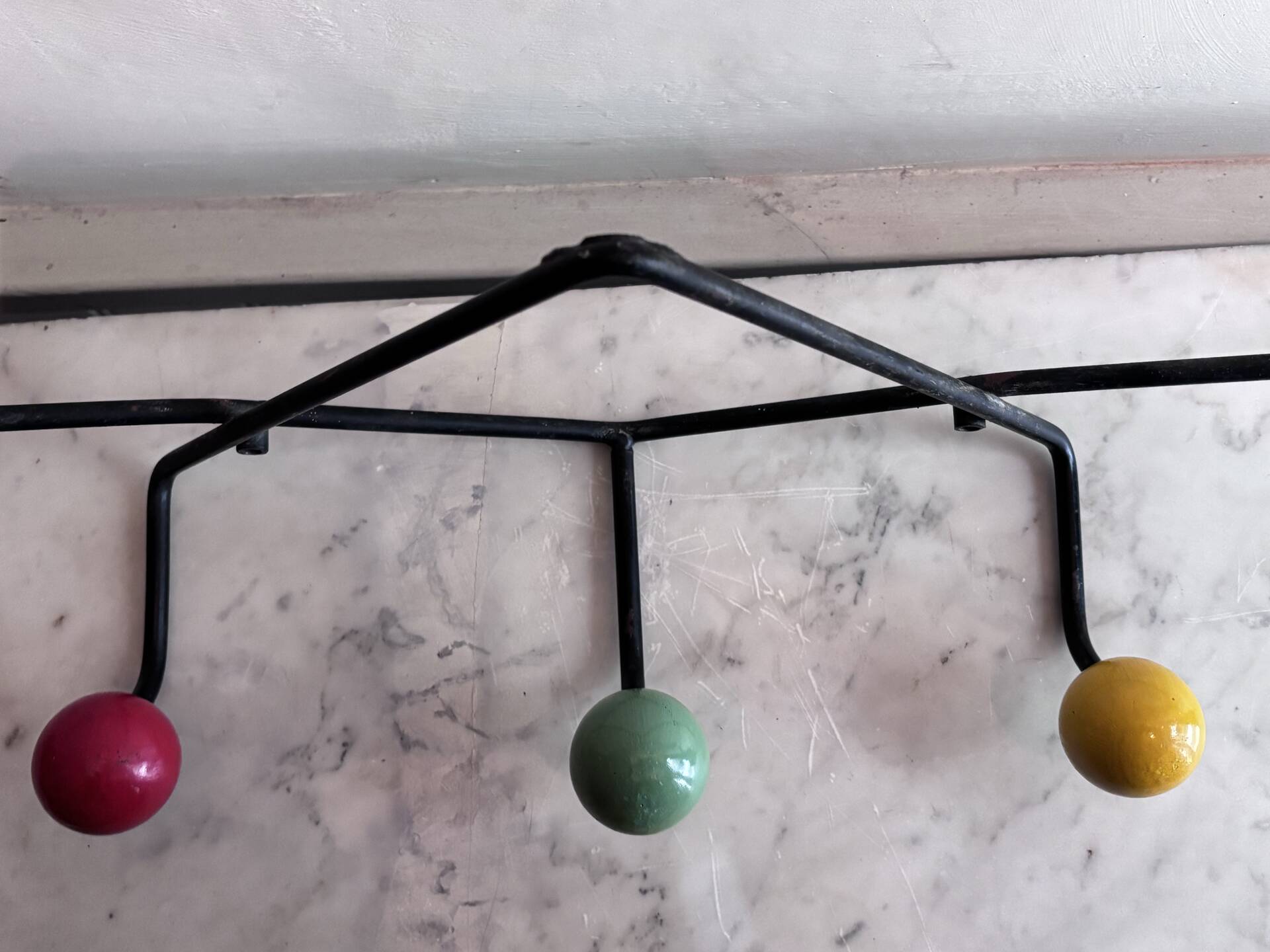 Wall coat rack Roger Feraud, metal and wooden balls.