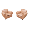 Pair of club chairs in skai