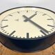 Grey industrial factory wall clock from pragotron, 1960s