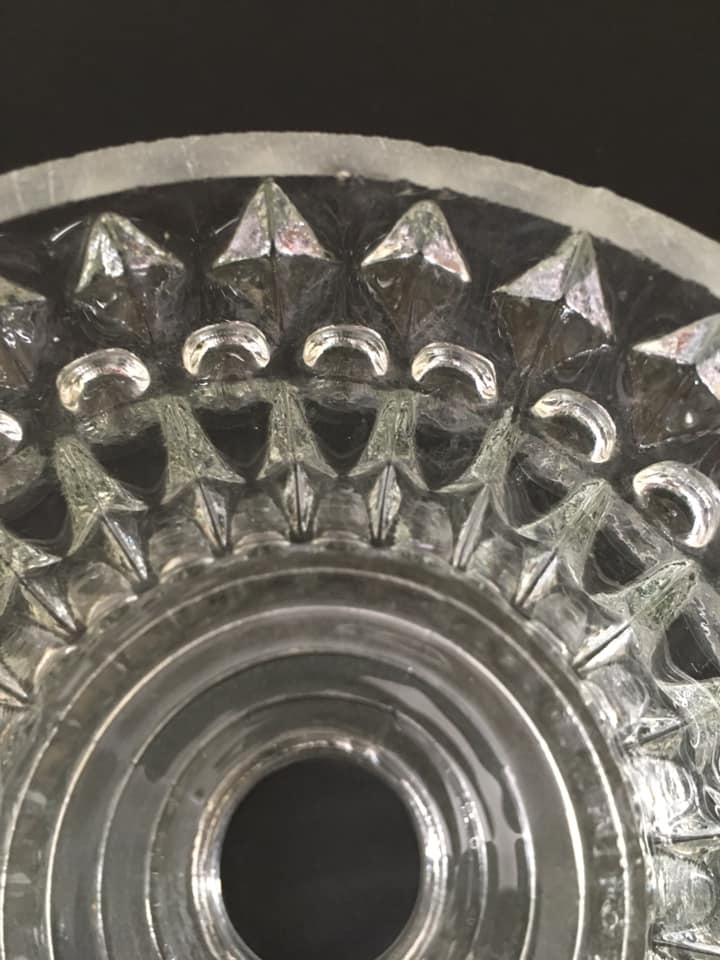 Antique globe in transparent white glass worked