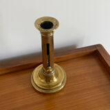 Old brass push candle holder