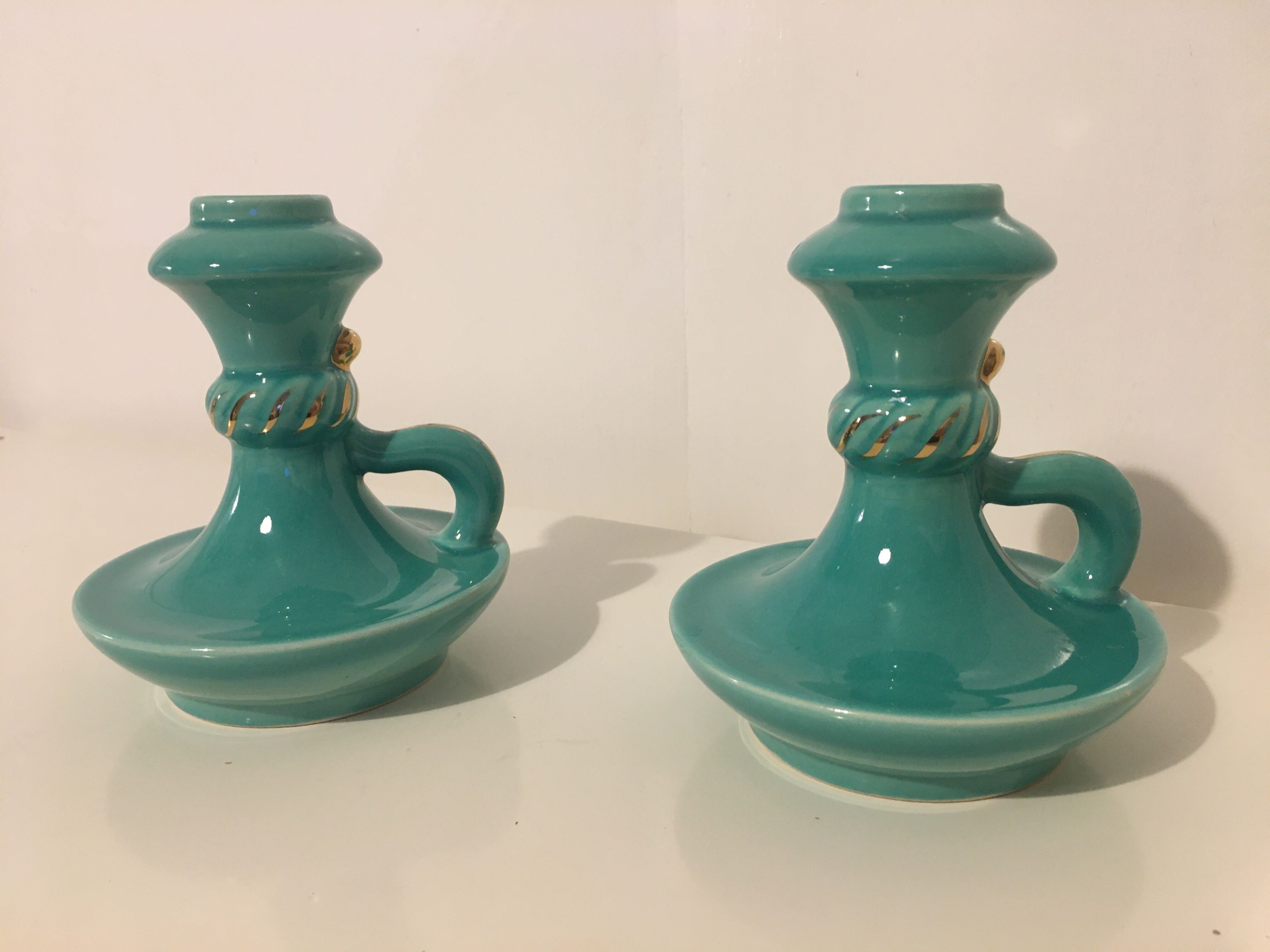 Pair of turquoise ceramic candlesticks