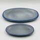 Set of two Boch blue dishes