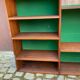 Vintage Scandinavian shelf from the 1960s in wood with green velvet.