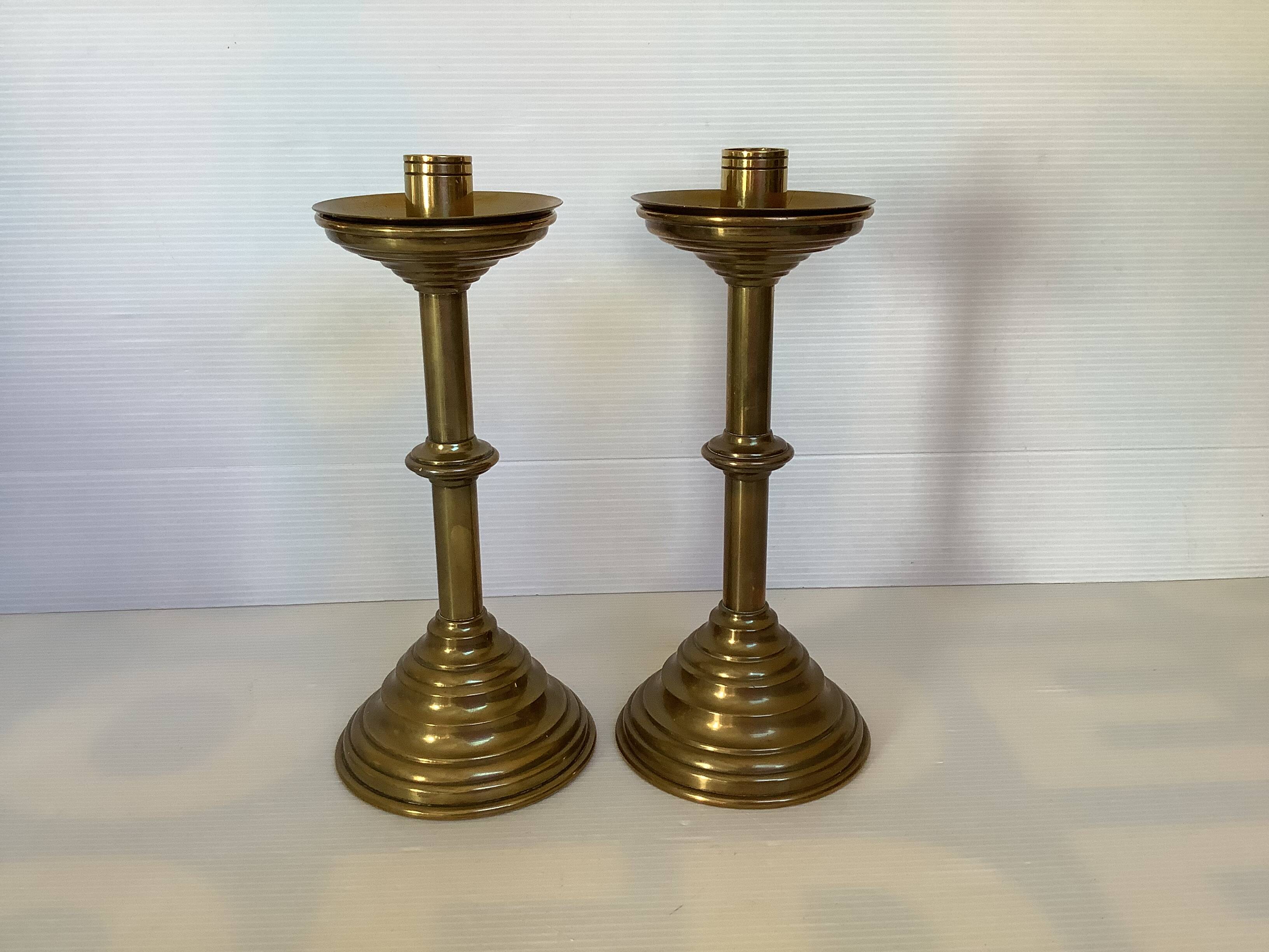 Pair of tulip foot candlesticks in brass