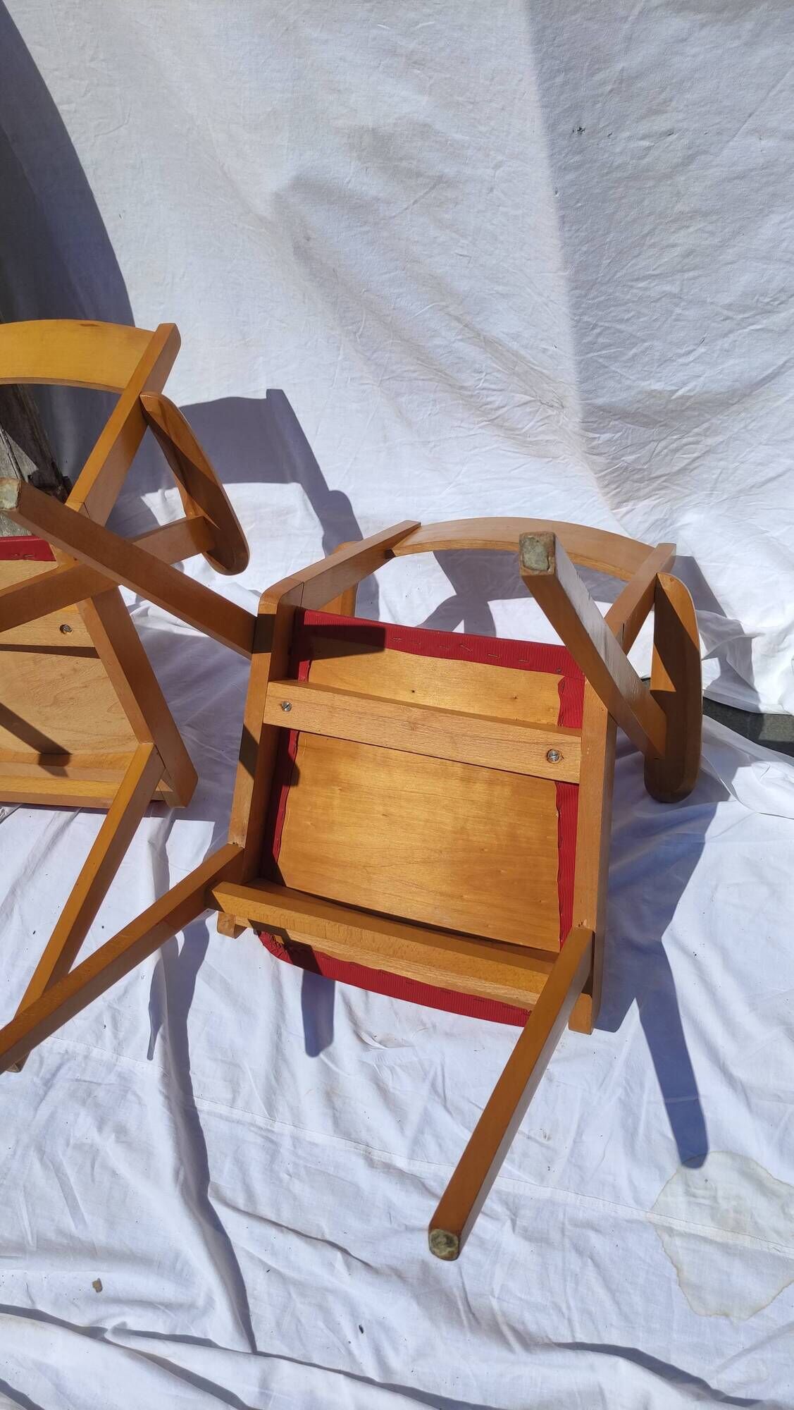 Pair of wooden armchairs and skaï foot compass of the 50s