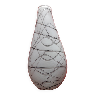 White glass vase with black lines and curves pattern