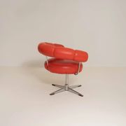 Vintage orange faux leather chair