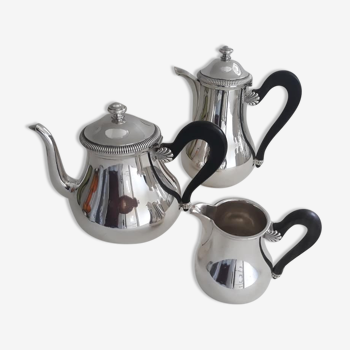 Silver metal service teapot coffee maker and milk pot decorated with godrons and shells