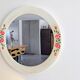 Vintage round mirror Syla model 6131 with rose decoration.