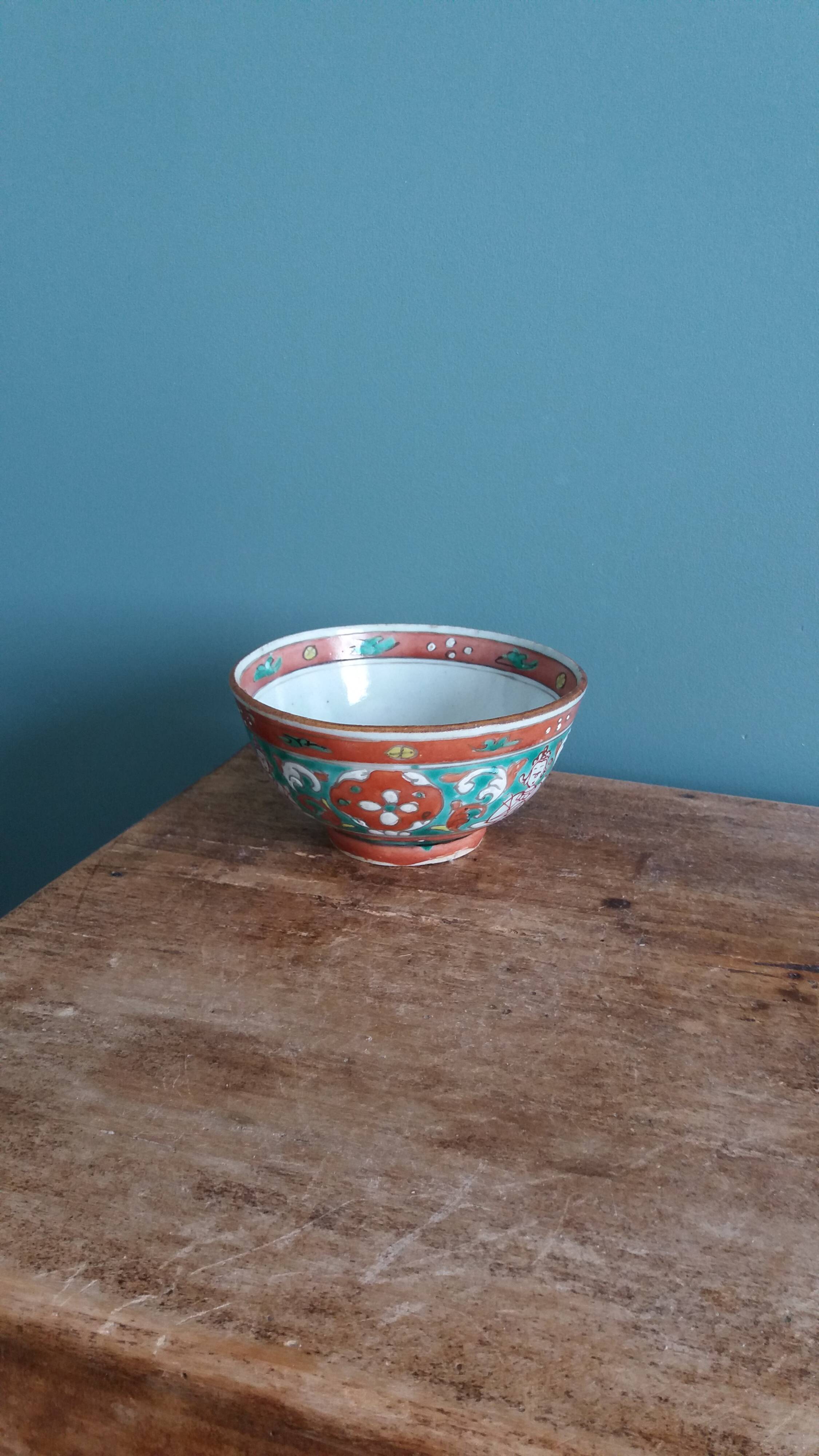 Ancient Chinese ceramic bowl from the 19th century in Bencharong style.