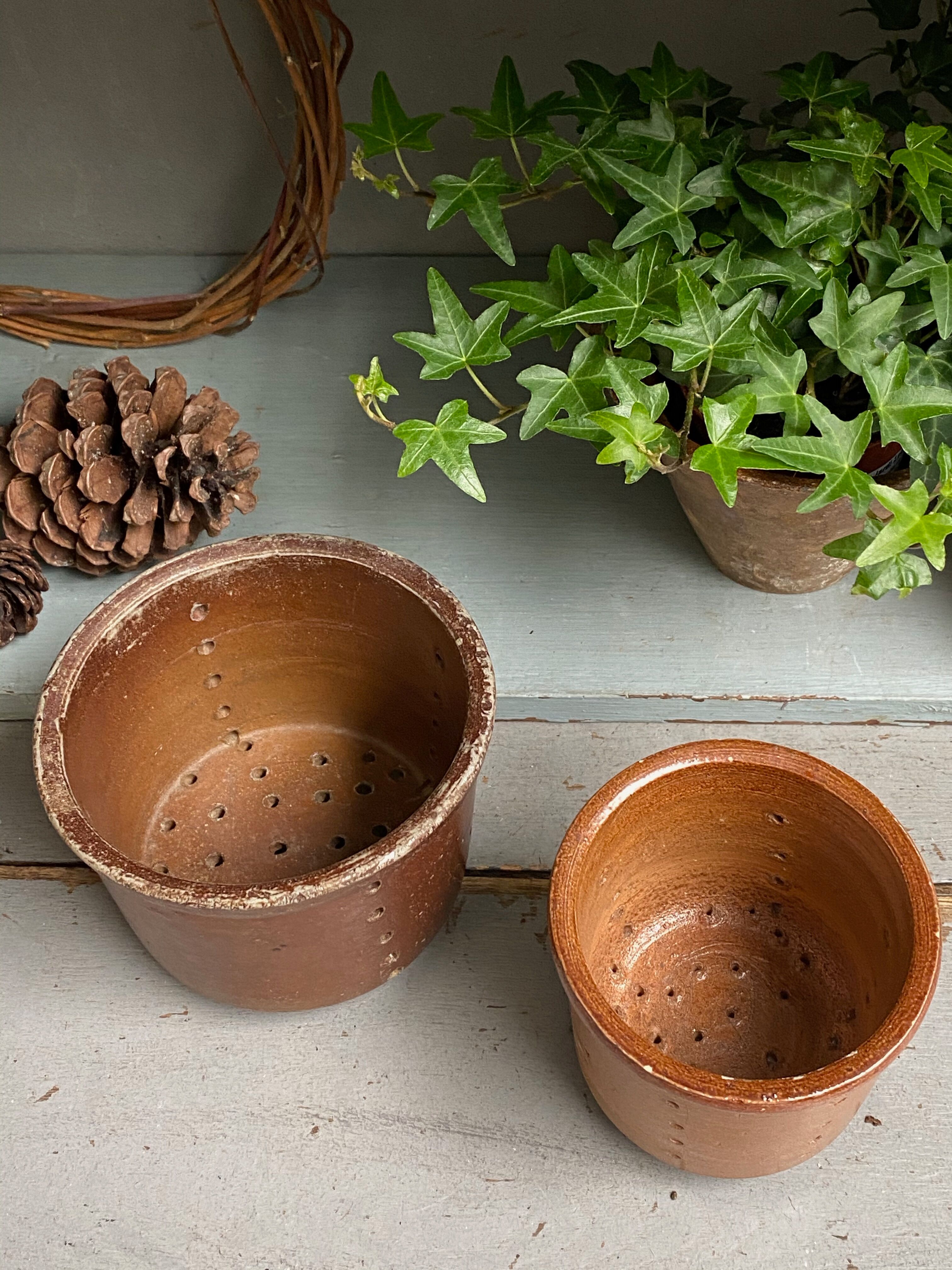 Pair of old faisselle molds