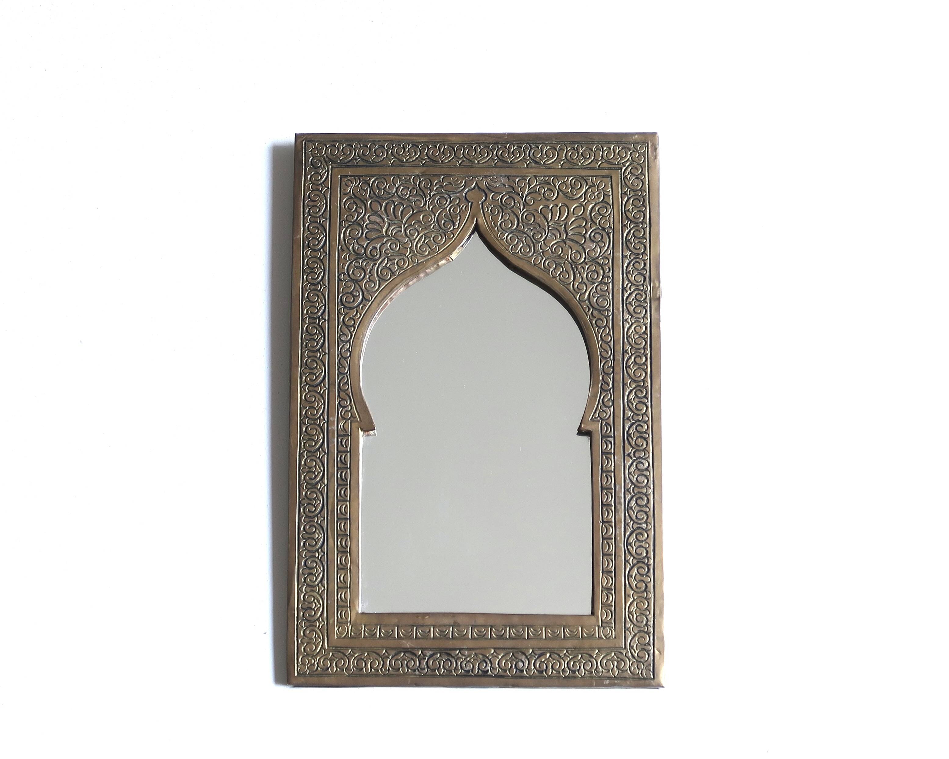 Rectangular Moroccan mirror in brass resembling a door, 1970s.